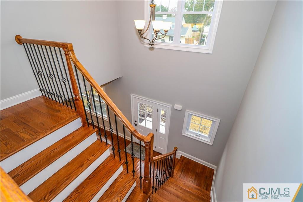 32 Windsor Road Edison, NJ 08817 - Photo 5 of 24 a view of entryway and hall with wooden floor