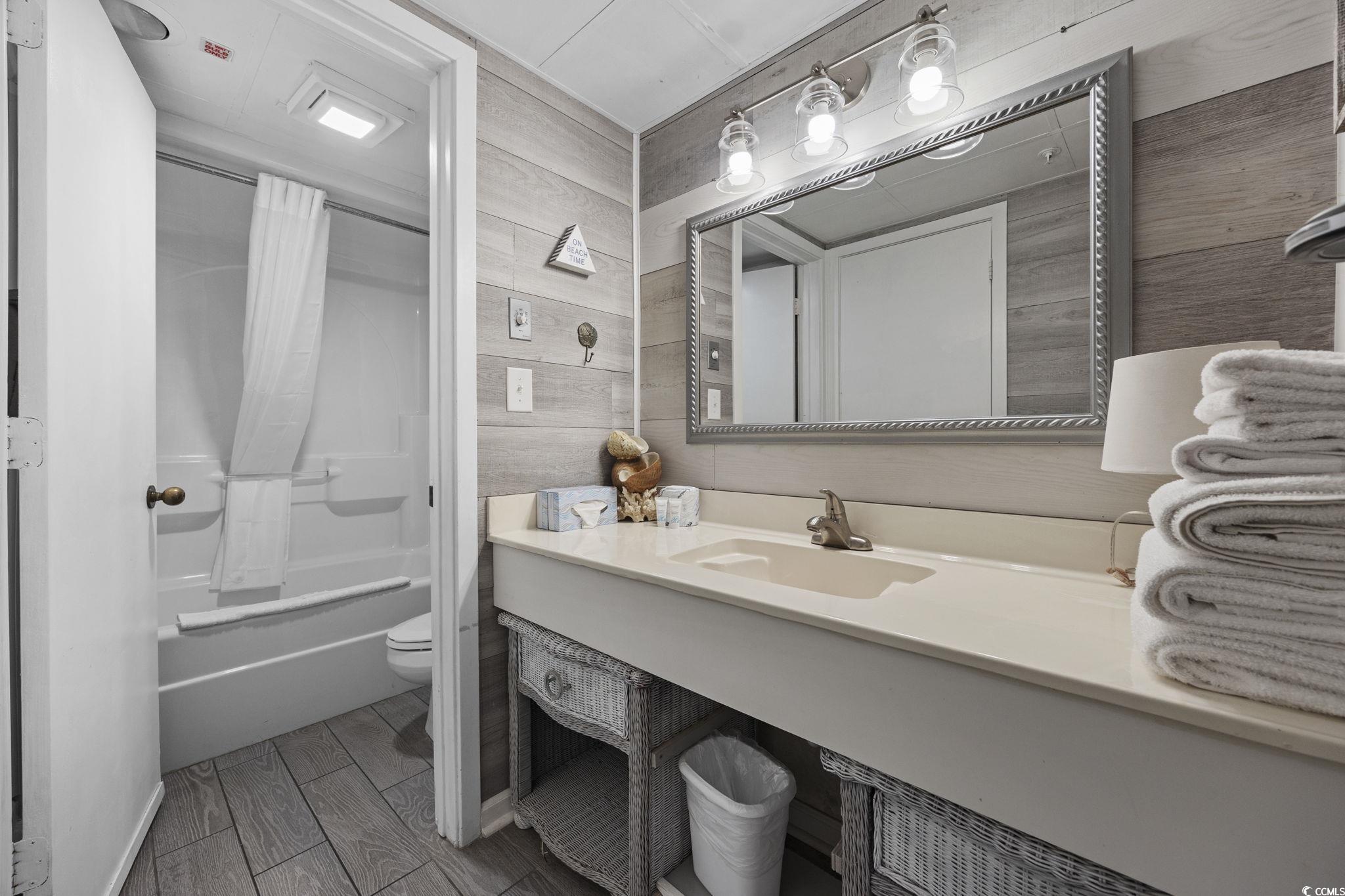 1501 South Ocean Boulevard, Unit 338 Myrtle Beach, SC 29577 - Photo 16 of 40 Full bathroom featuring shower / bath combo and vanity