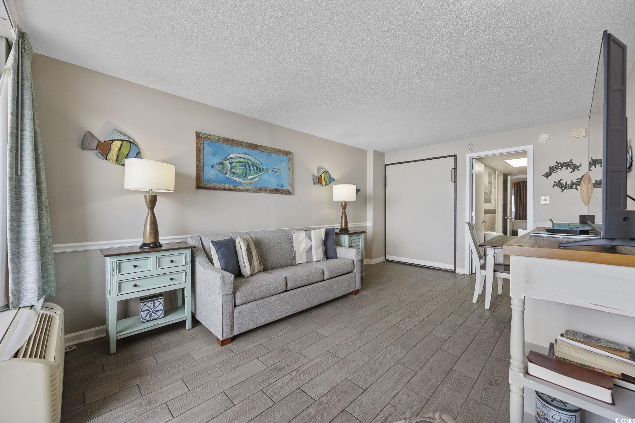 1501 South Ocean Boulevard, Unit 338 Myrtle Beach, SC 29577 - Photo 9 of 40 Living area with murphy bed