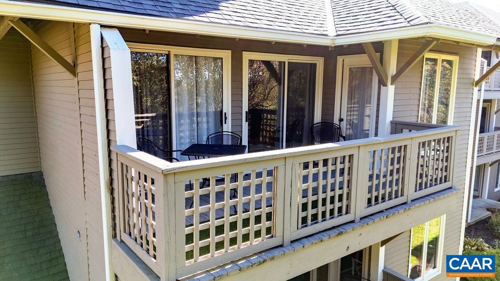 2048 Stone Ridge Wintergreen, VA 22967 - Photo 34 of 36 a view of a brick house with large windows