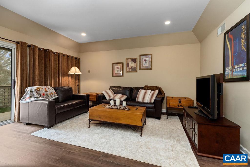 2048 Stone Ridge Wintergreen, VA 22967 - Photo 6 of 36 a living room with furniture and a flat screen tv