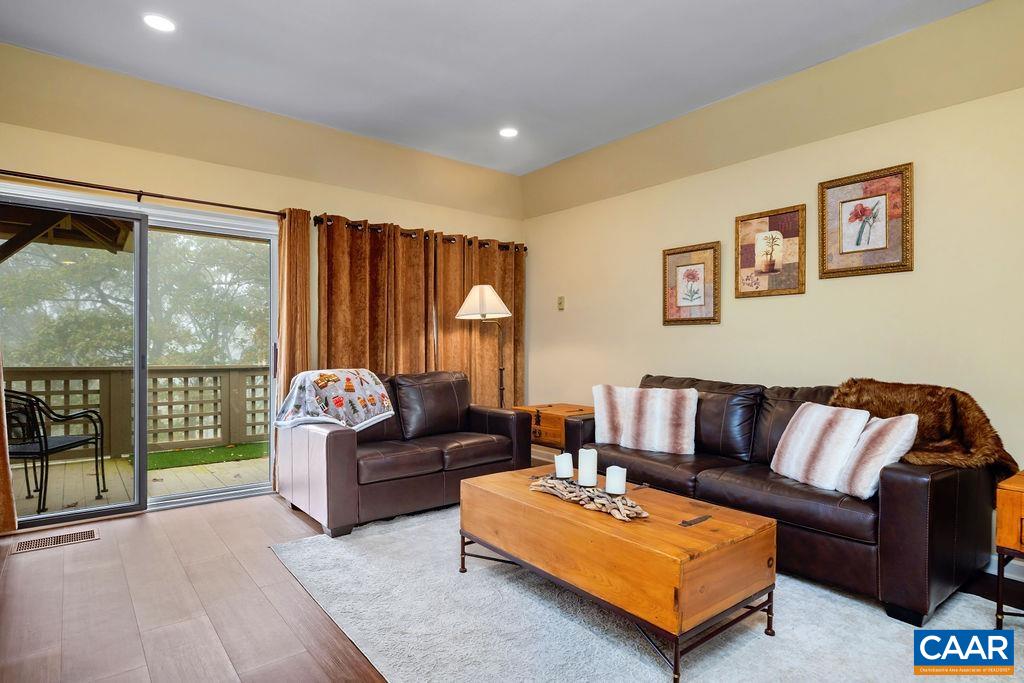 2048 Stone Ridge Wintergreen, VA 22967 - Photo 7 of 36 a living room with furniture and a large window