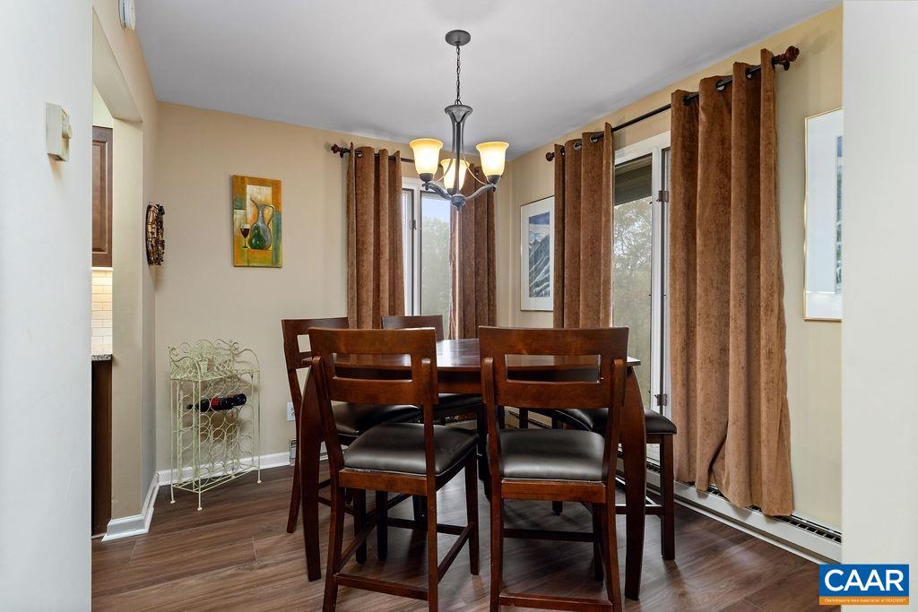 2048 Stone Ridge Wintergreen, VA 22967 - Photo 9 of 36 a view of a dining room with furniture window and wooden floor