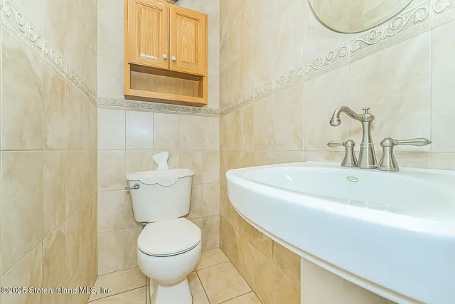 a bathroom with a toilet and a sink