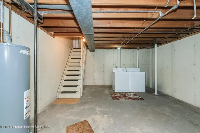 a view of a room with stairs and furniture