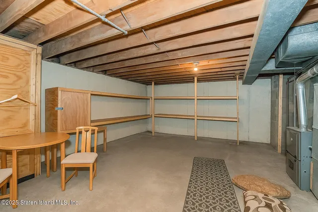 a view of an empty room with a windows