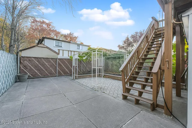 a view of a terrace with chairs