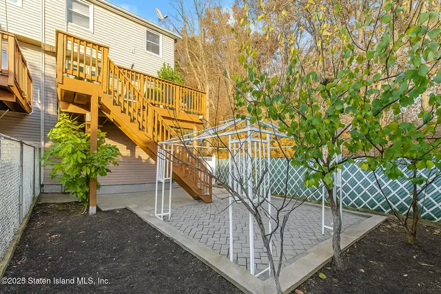a view of a building with a tree