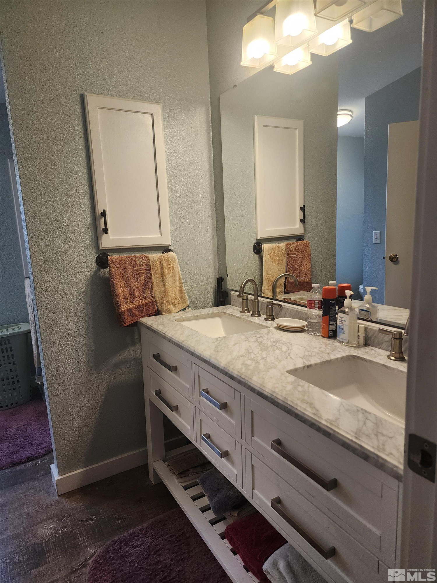 2650 Harvey Lane Fallon, NV 89406 - Photo 14 of 29 a bathroom with a granite countertop sink and a mirror