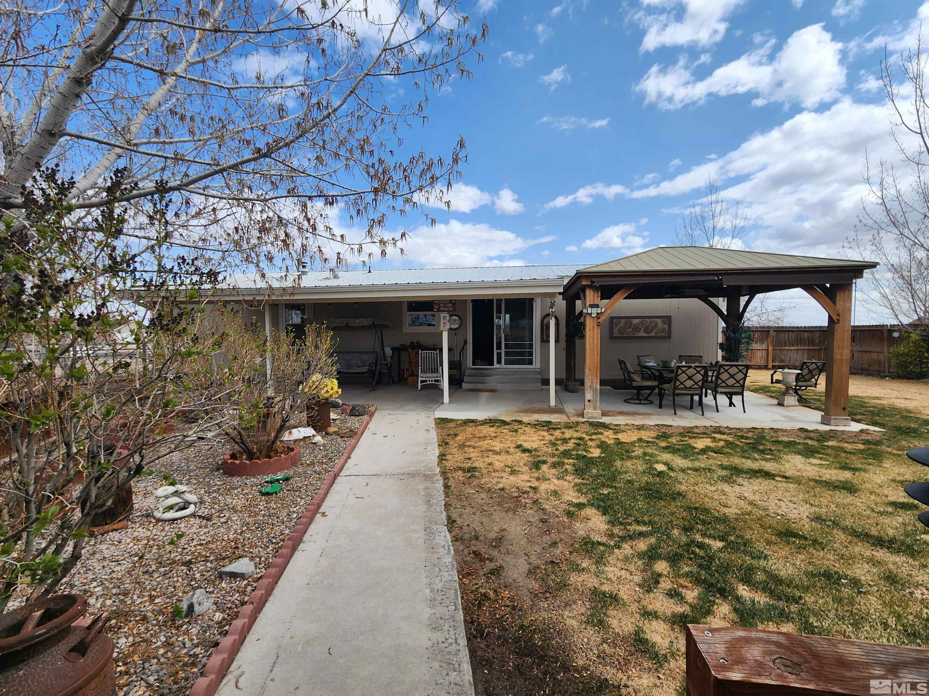 2650 Harvey Lane Fallon, NV 89406 - Photo 20 of 29 a view of a porch with furniture and a yard