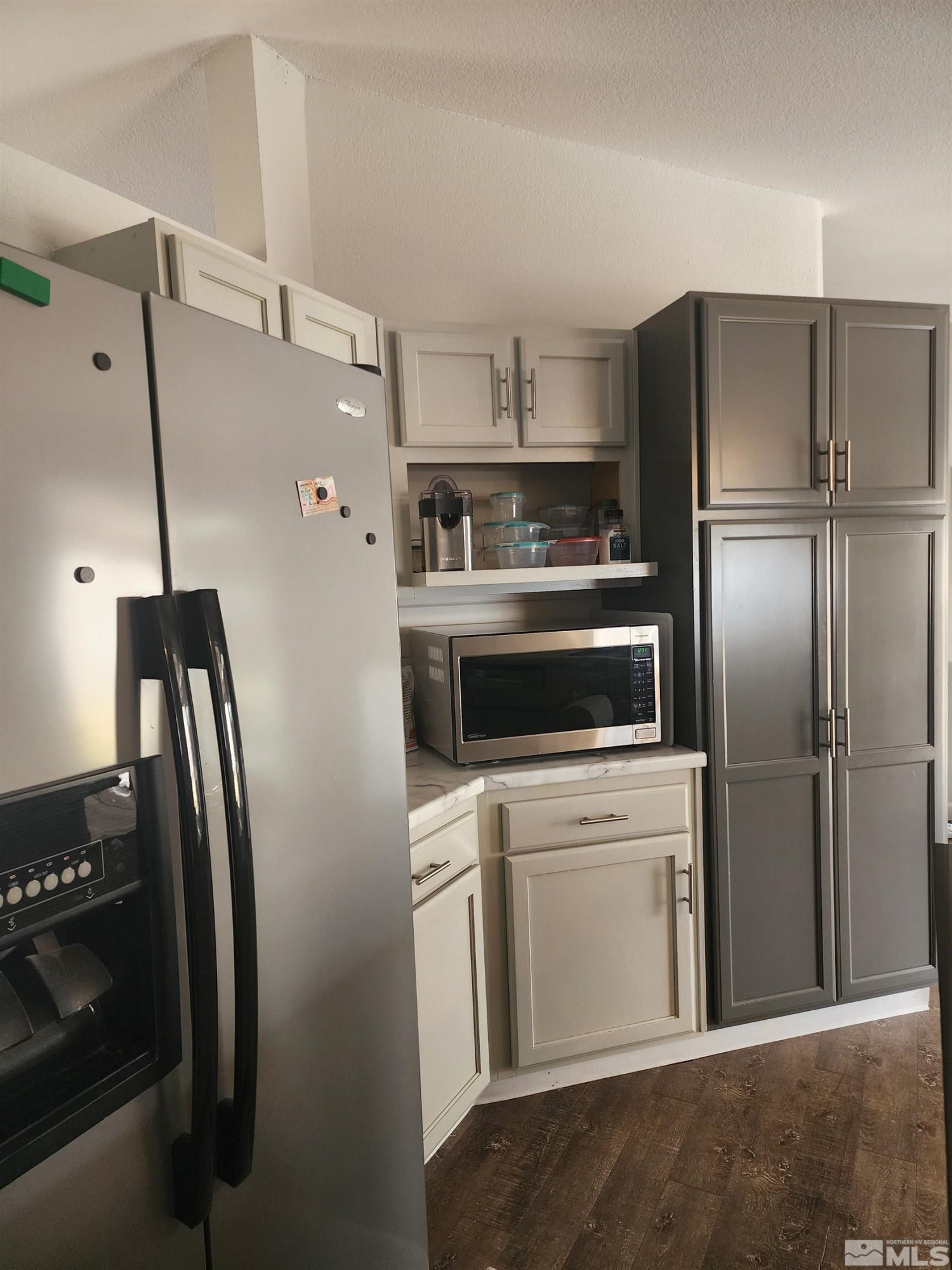 2650 Harvey Lane Fallon, NV 89406 - Photo 4 of 29 a metallic refrigerator freezer sitting in a kitchen