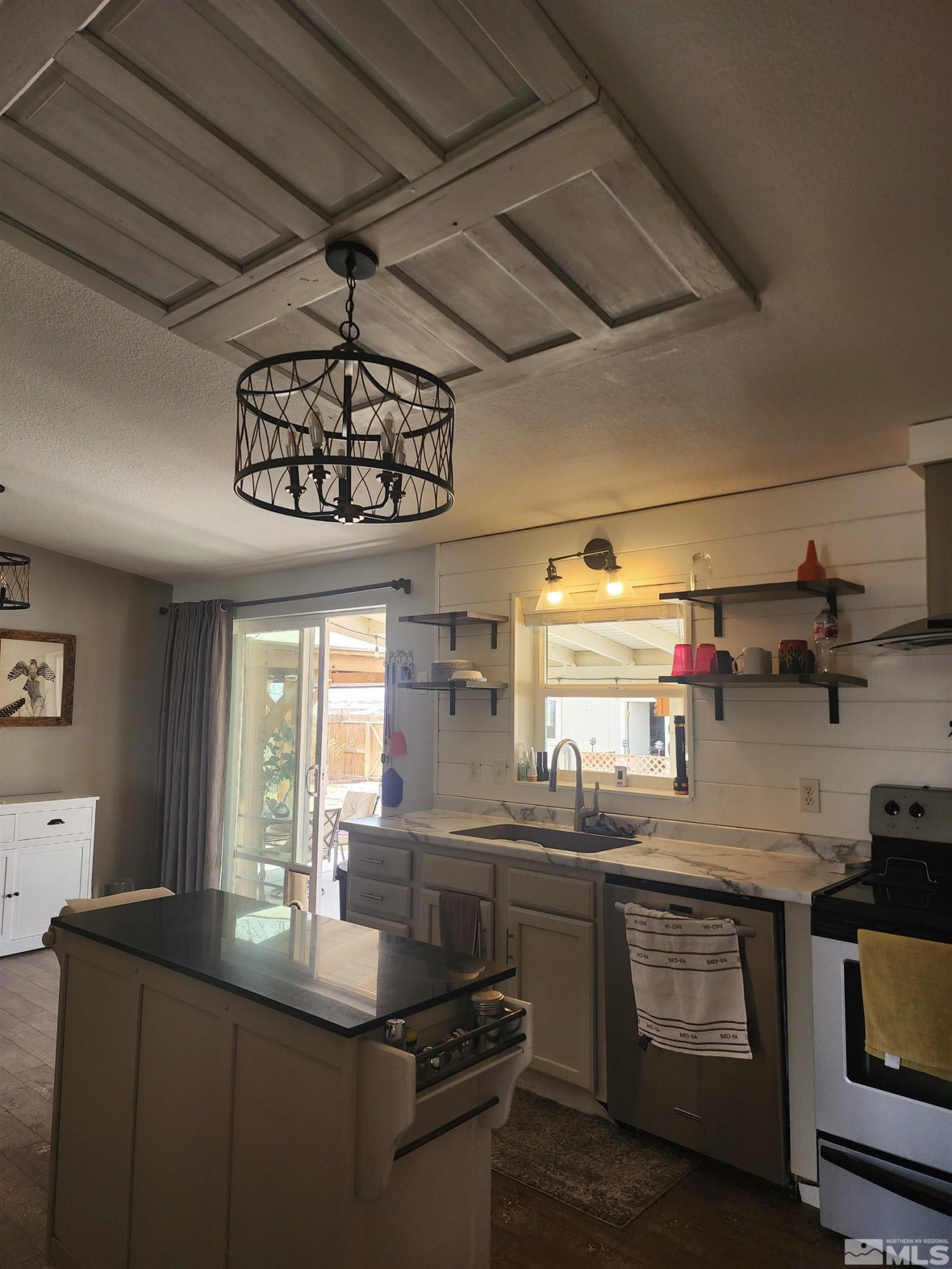 2650 Harvey Lane Fallon, NV 89406 - Photo 7 of 29 a kitchen with stainless steel appliances a sink and cabinets