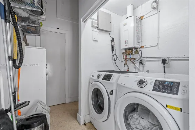 a view of a patio with table and chairs potted plants and large tree