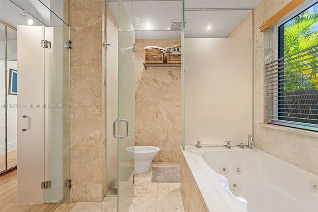 an outdoor space with seating area and potted plants