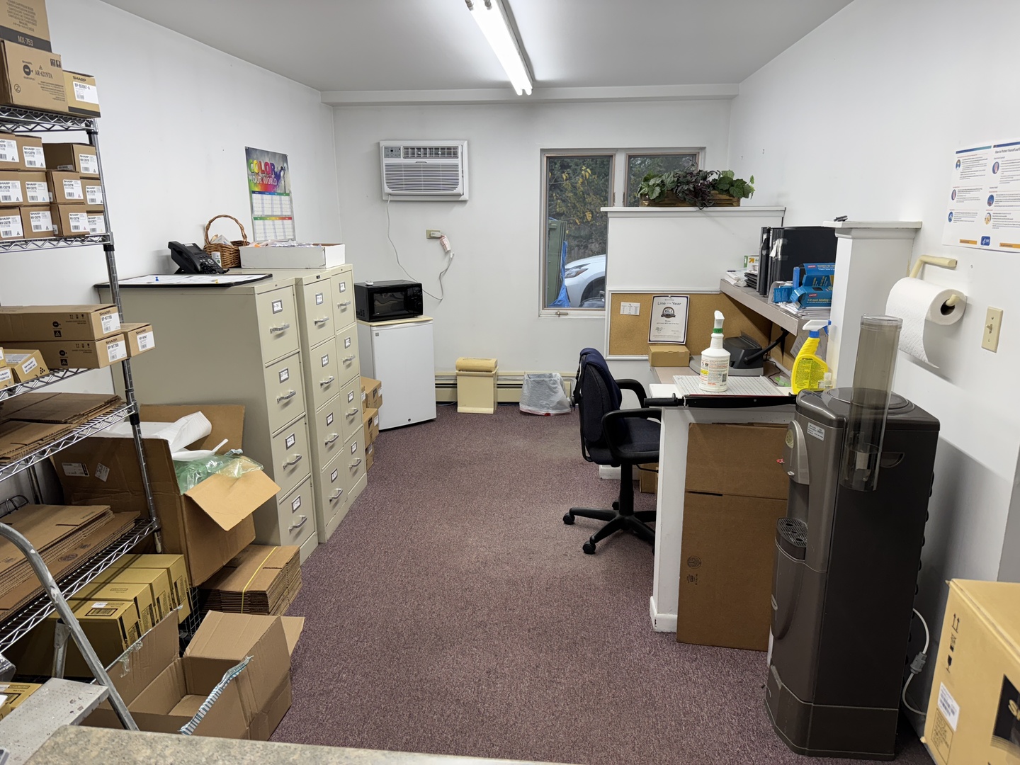2936 Bernice Road Lansing, IL 60438 - Photo 11 of 28 a view of a workspace with furniture and a window