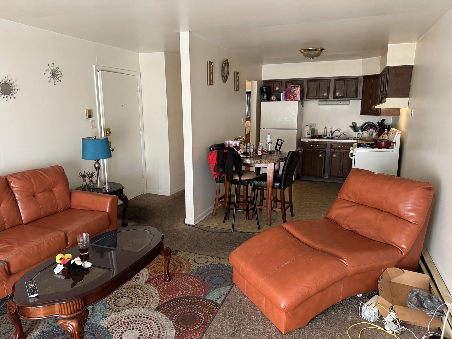 2936 Bernice Road Lansing, IL 60438 - Photo 21 of 28 a living room with furniture a rug and a dining table