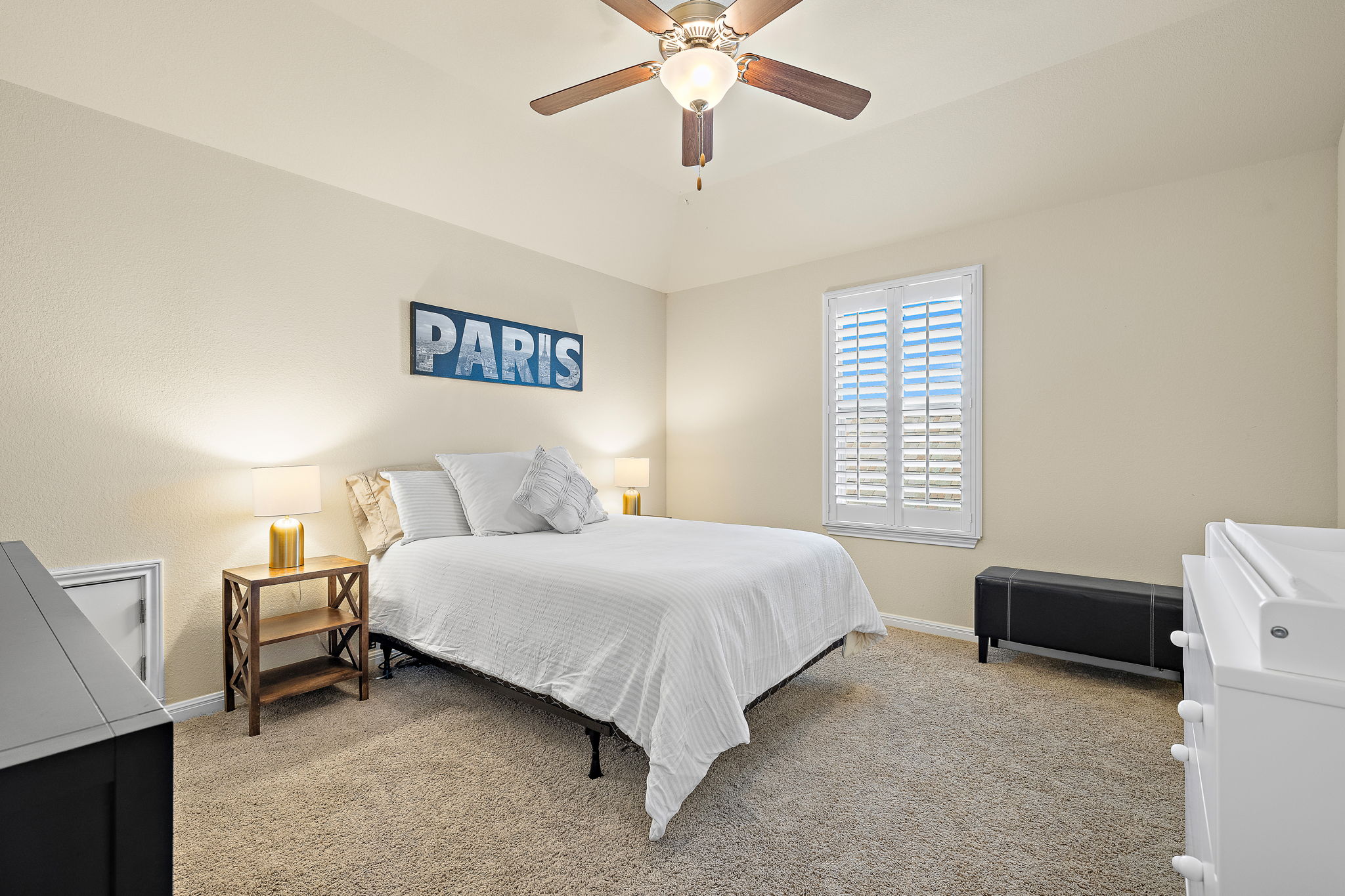 4413 Tambre Bend Austin, TX 78738 - Photo 20 of 30 Carpeted bedroom with a ceiling fan and vaulted ceiling