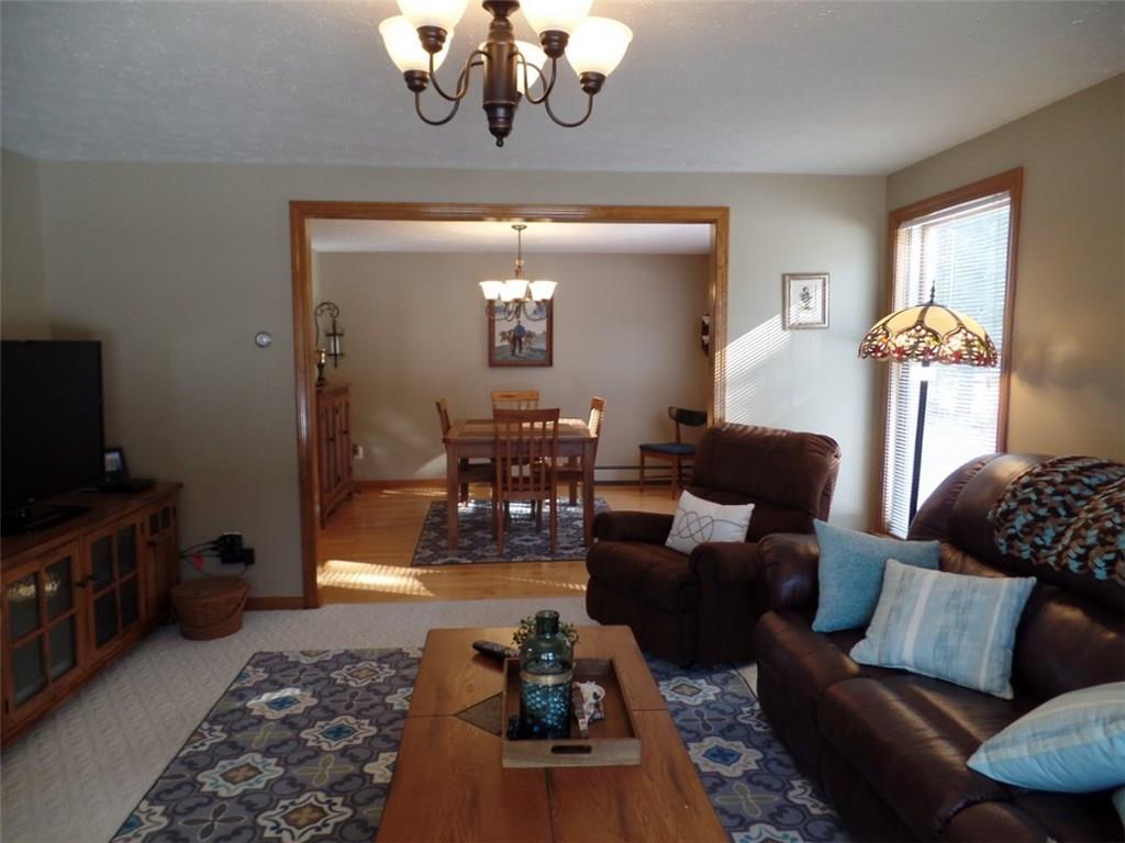 8 Twin Pond Road Topsham, ME 04086 - Photo 15 of 34 Living room area and dining area of...