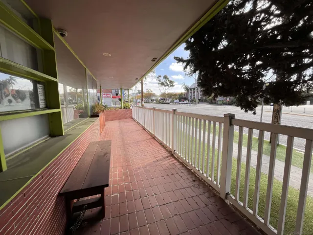a view of a chairs and table in a patio