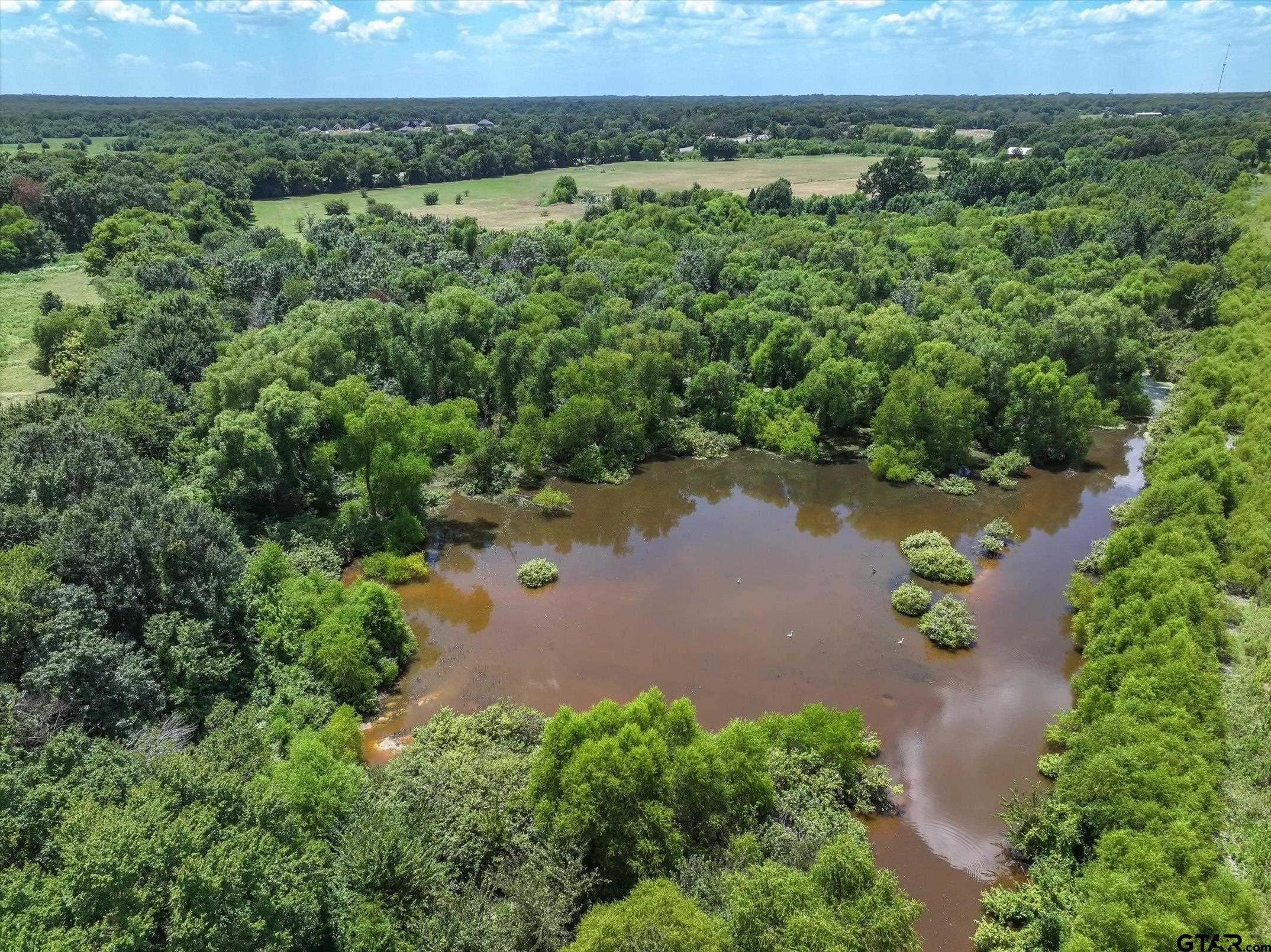 15542 Us Highway Edgewood, TX 75117 - Photo 16 of 23 an aerial view of a houses with outdoor space and street view