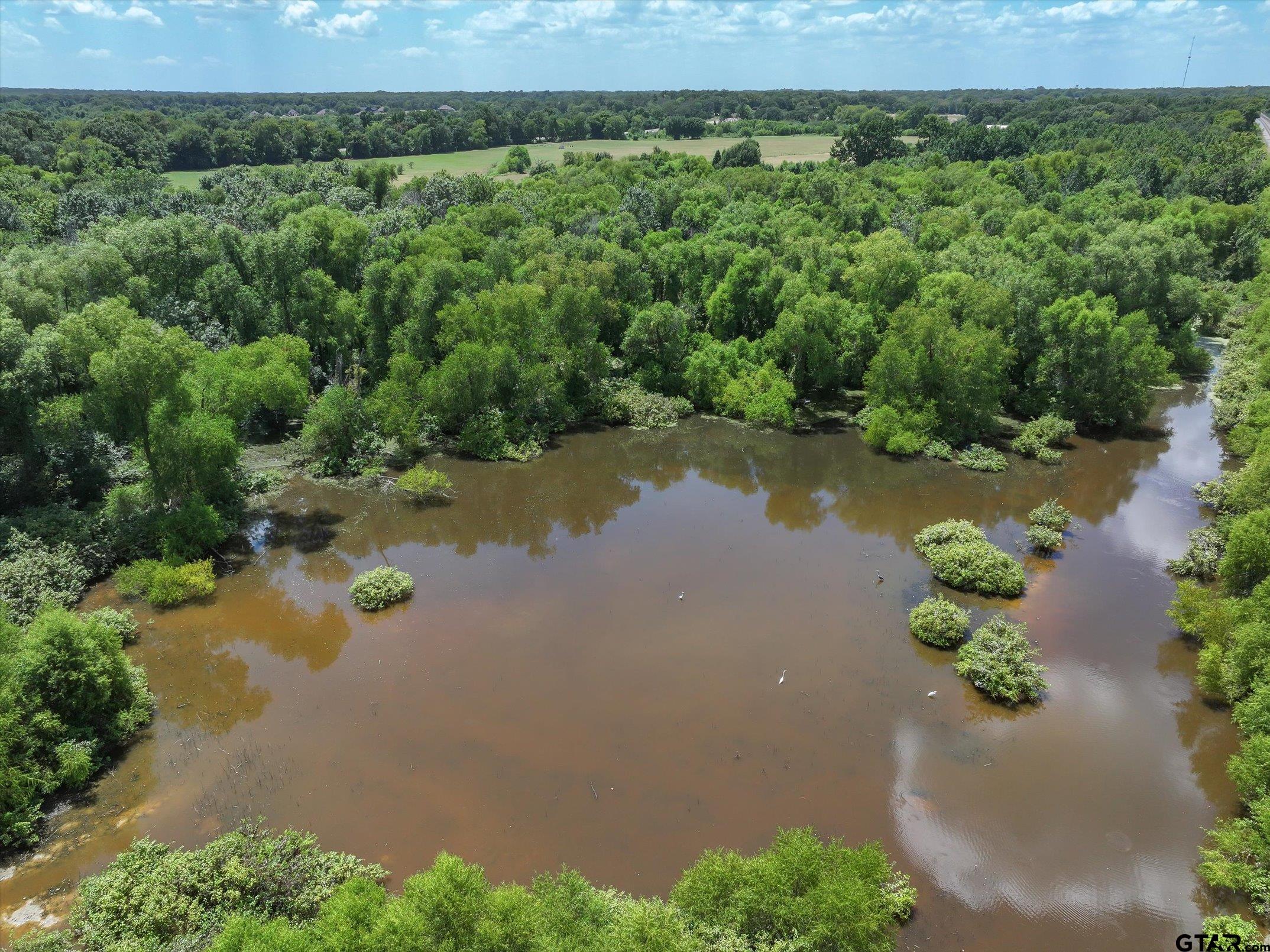 15542 Us Highway Edgewood, TX 75117 - Photo 17 of 23 an aerial view of a houses with yard