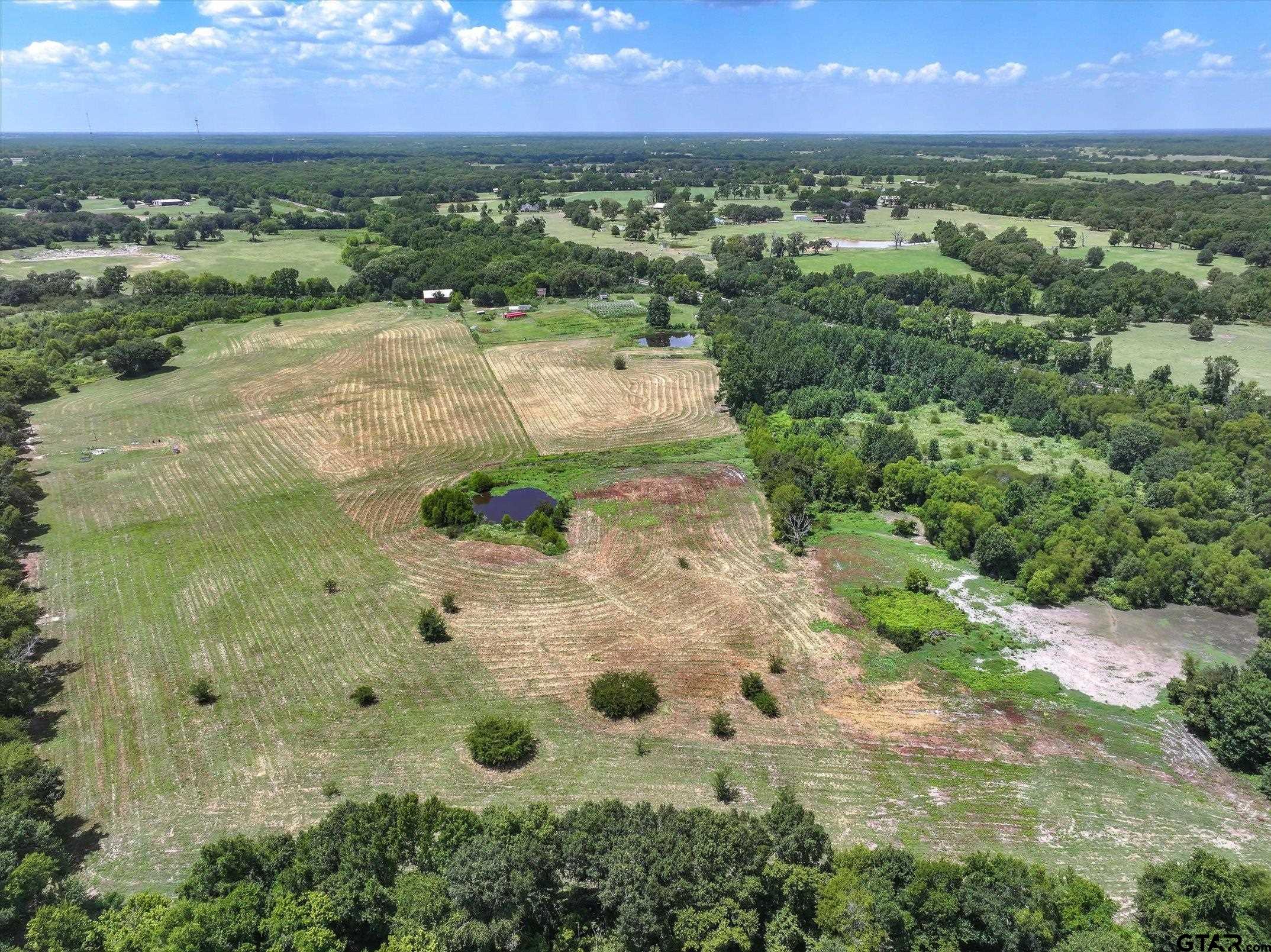 15542 Us Highway Edgewood, TX 75117 - Photo 23 of 23 a view of a city with a lake