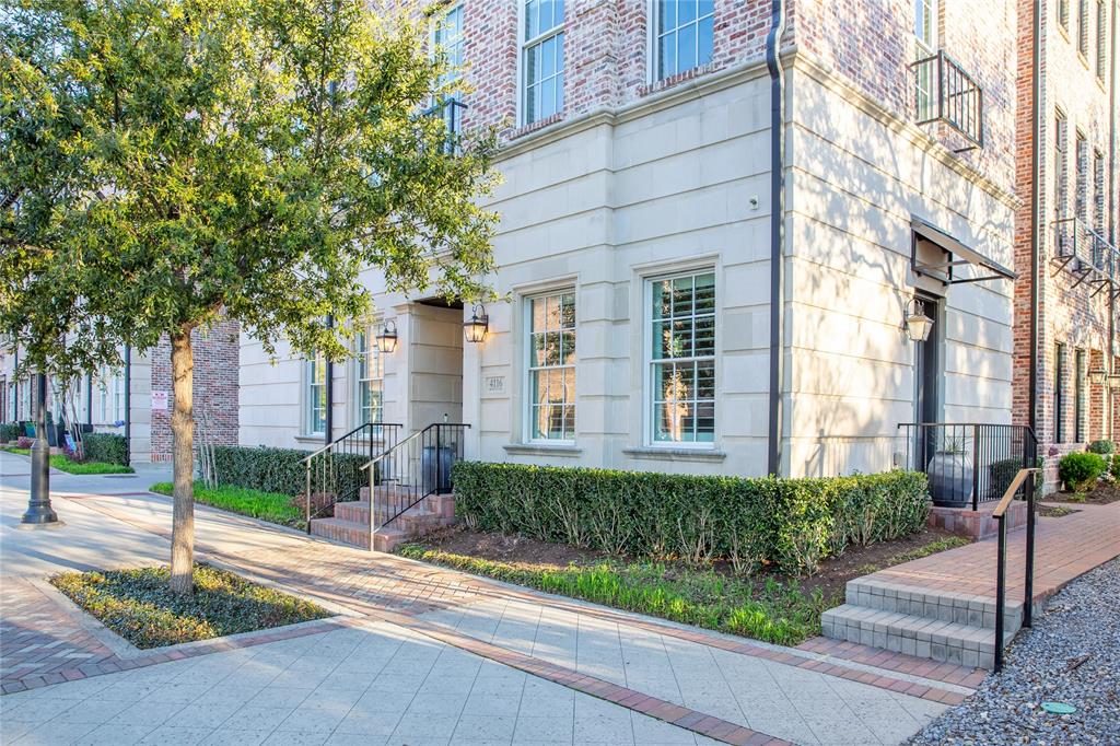 4116 Runyon Road Addison, TX 75001 - Photo 2 of 31 a front view of a building with garden