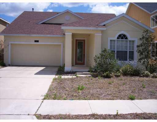 14514 Yellow Butterfly Road Windermere, FL 34786 - Photo 1 of 1 a front view of a house with garden