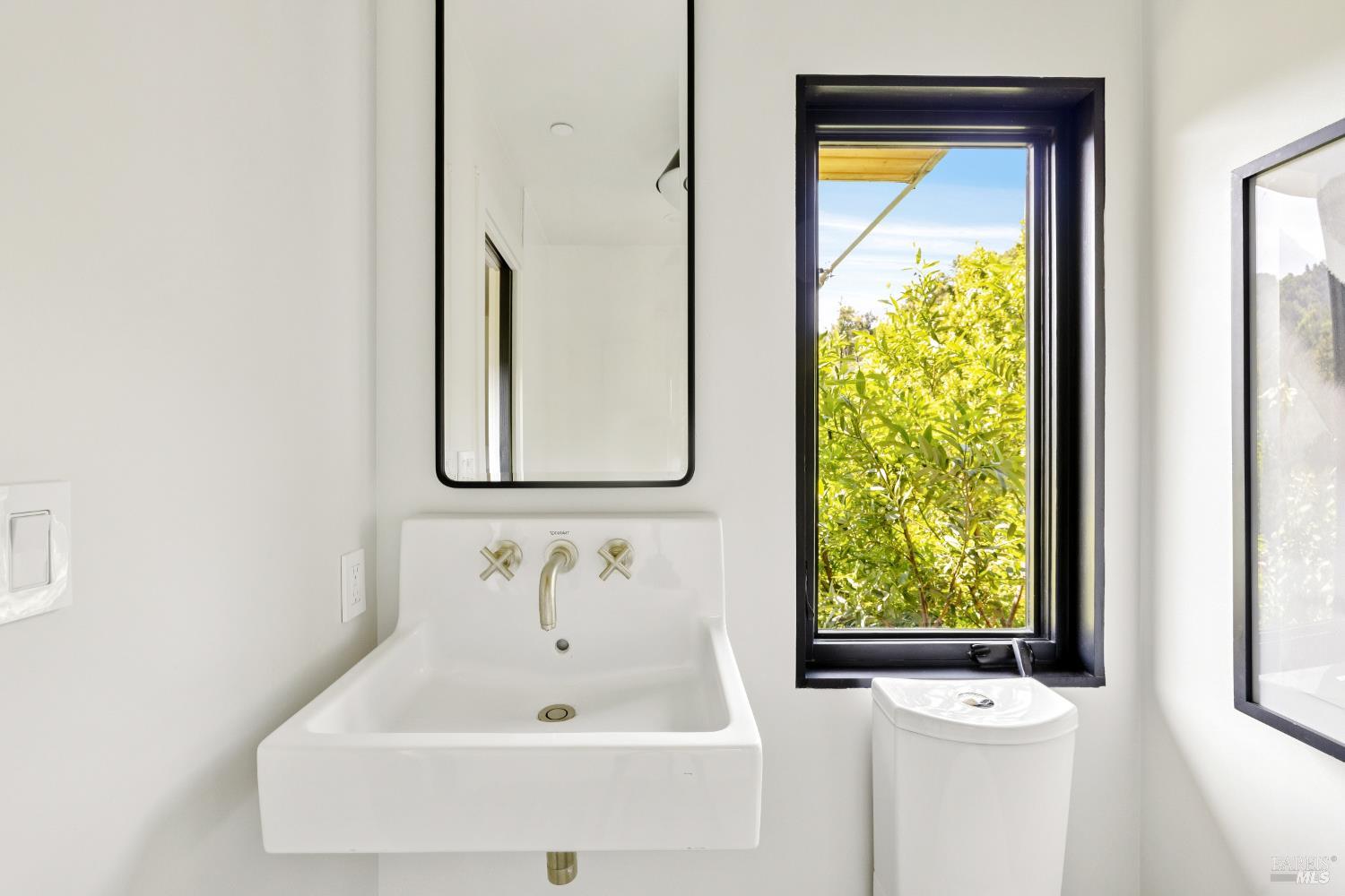 56 Millard Road Larkspur, CA 94939 - Photo 51 of 74 a bathroom with a bathtub and a window
