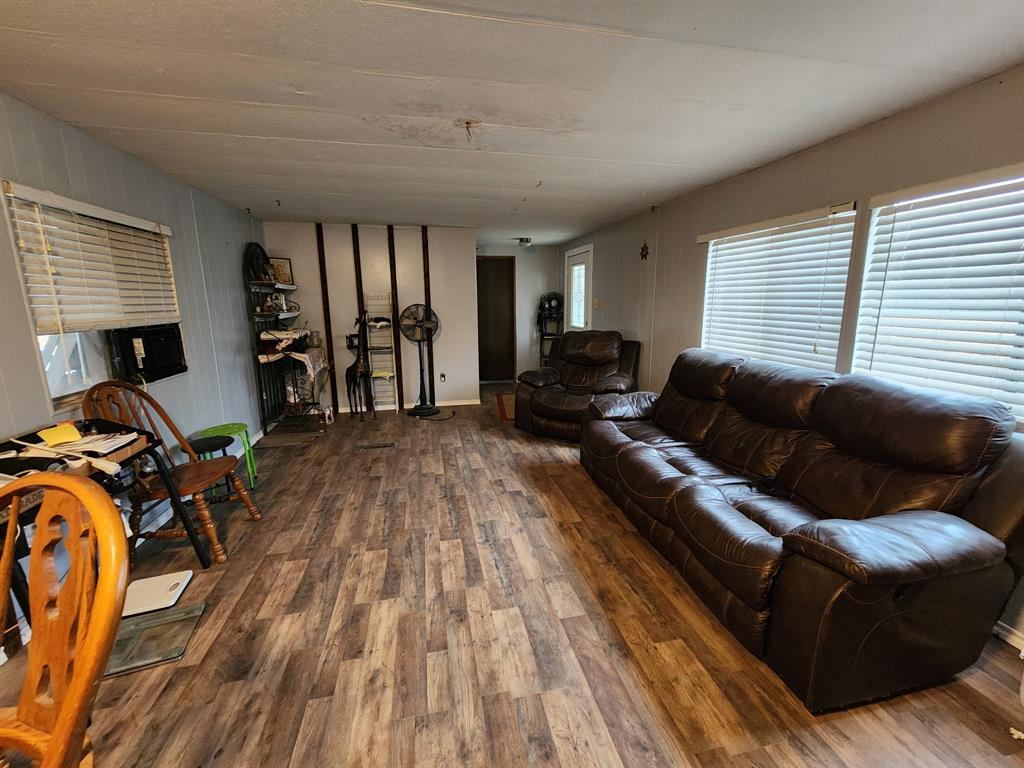 505 County Road 1442 Yantis, TX 75497 - Photo 9 of 19 a living room with furniture and a wooden floor