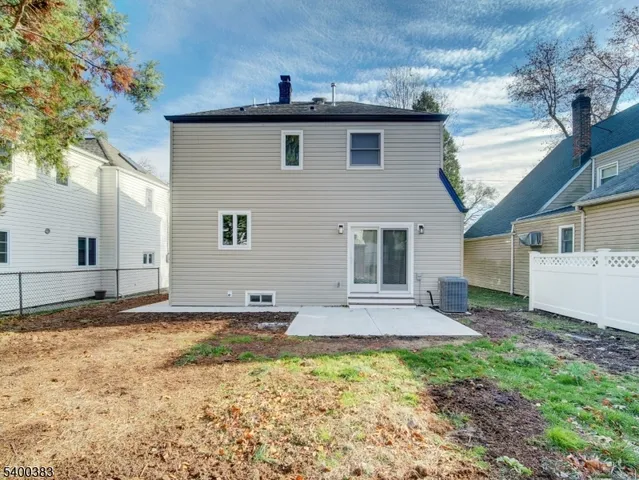 a view of an entryway with wooden floor and door