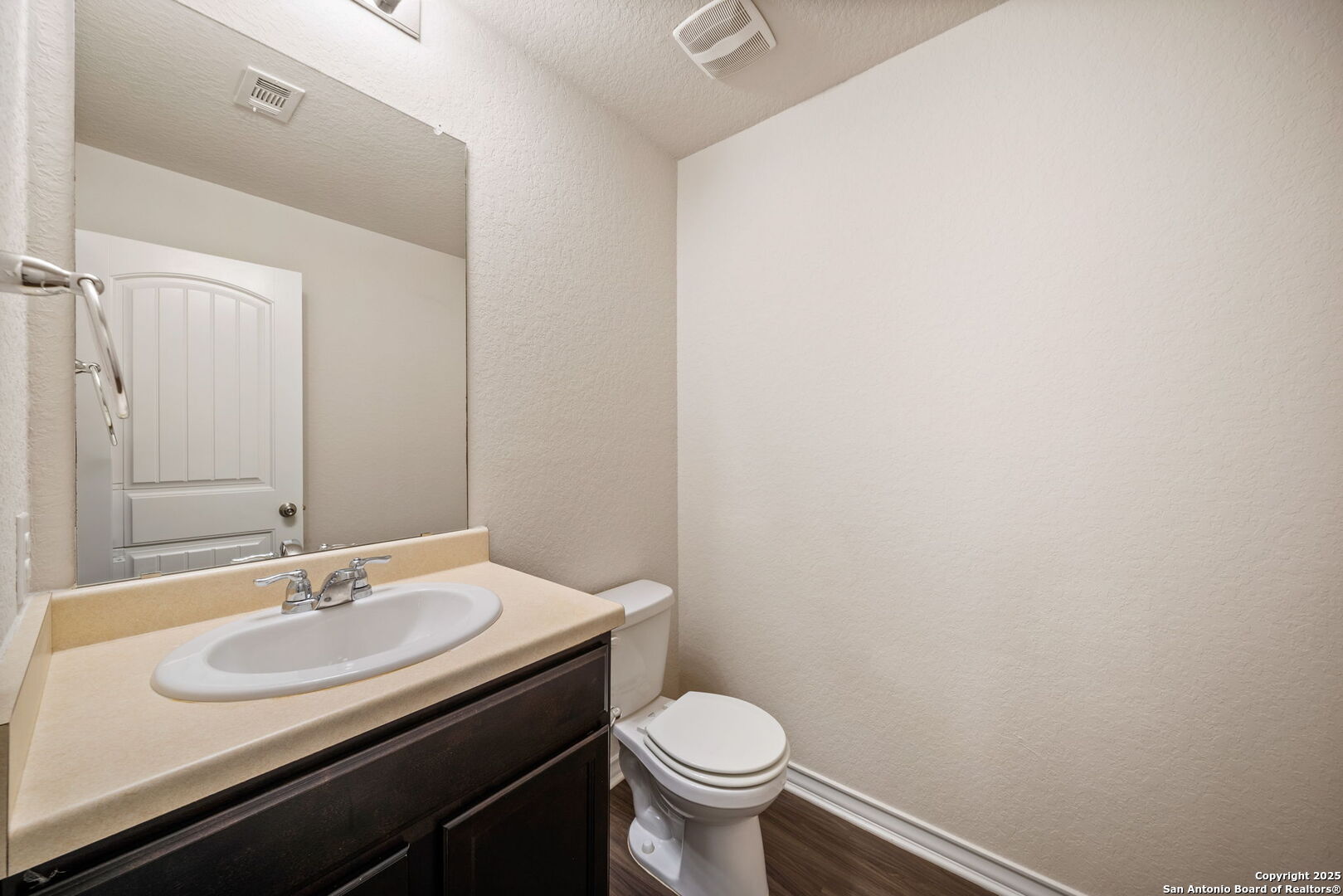 13415 Wild Rye San Antonio, TX 78254 - Photo 15 of 49 a bathroom with a sink and a toilet