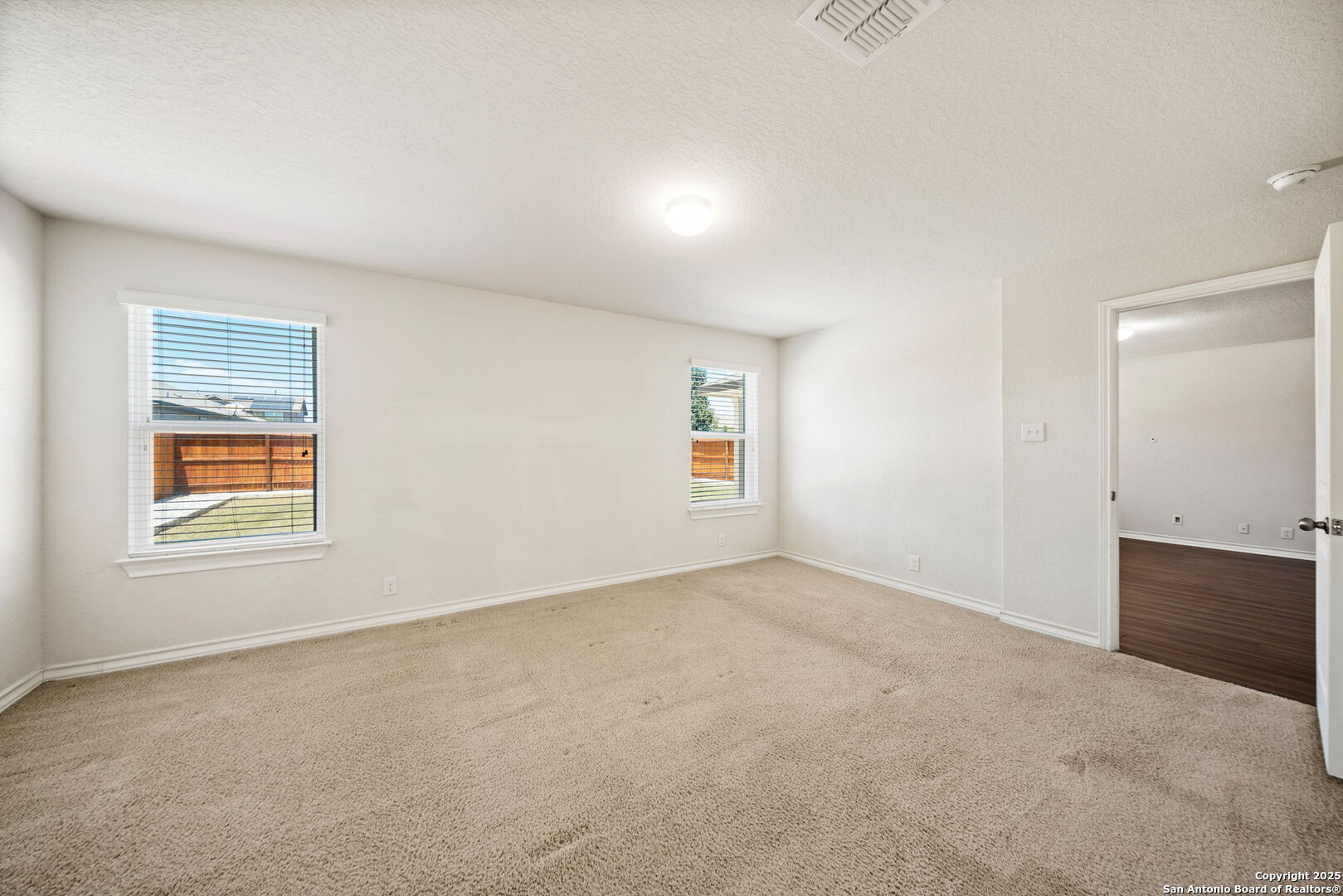 13415 Wild Rye San Antonio, TX 78254 - Photo 18 of 49 an empty room with windows