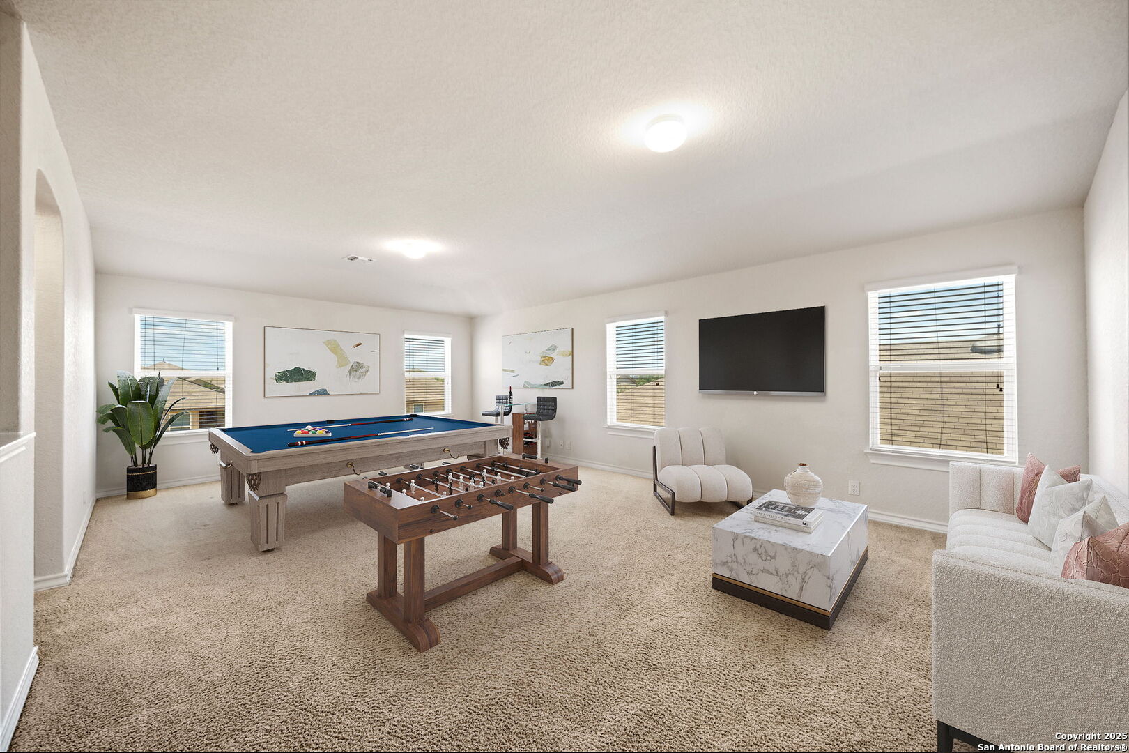13415 Wild Rye San Antonio, TX 78254 - Photo 23 of 49 a living room with furniture a flat screen tv and a window