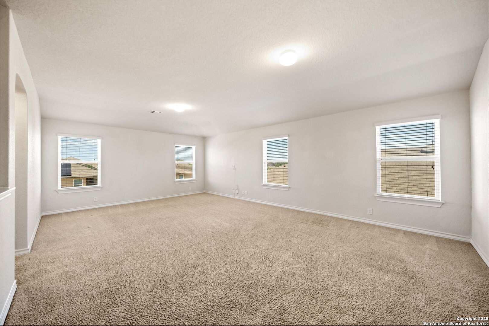 13415 Wild Rye San Antonio, TX 78254 - Photo 24 of 49 an empty room with windows