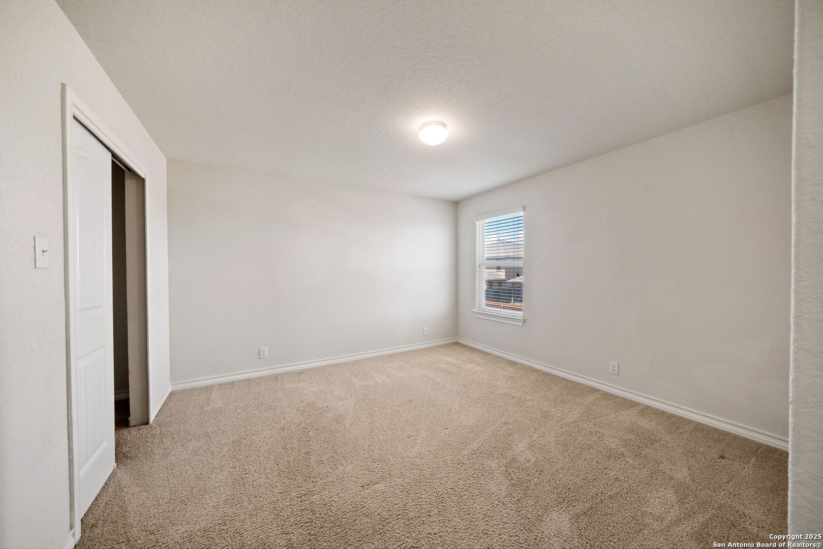 13415 Wild Rye San Antonio, TX 78254 - Photo 28 of 49 a view of an empty room with a window