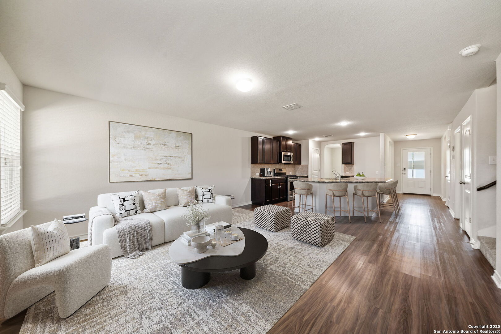 13415 Wild Rye San Antonio, TX 78254 - Photo 3 of 49 a living room with furniture and wooden floor