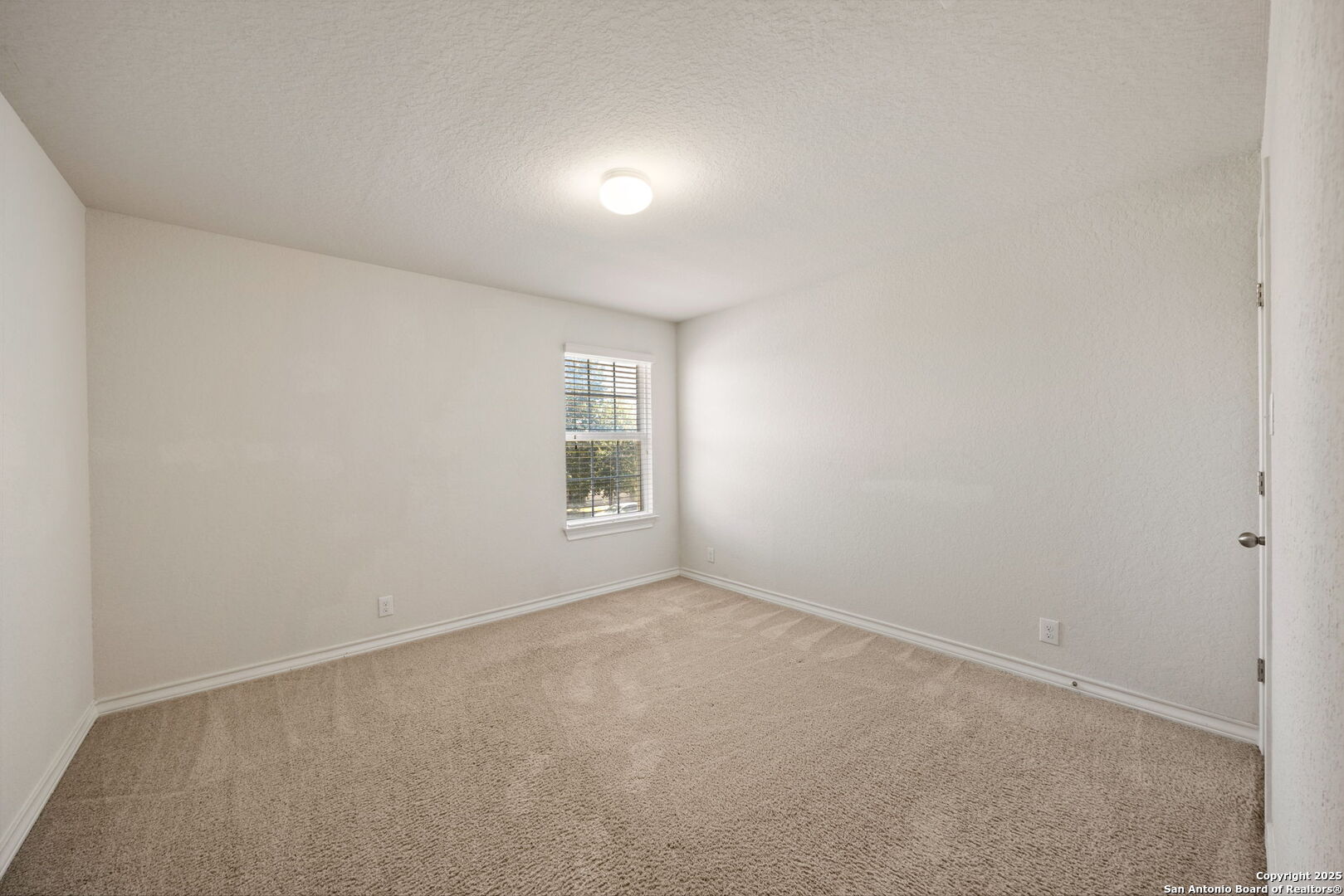 13415 Wild Rye San Antonio, TX 78254 - Photo 32 of 49 an empty room with windows