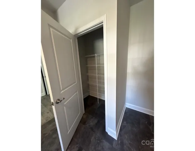 a view of balcony with wooden floor