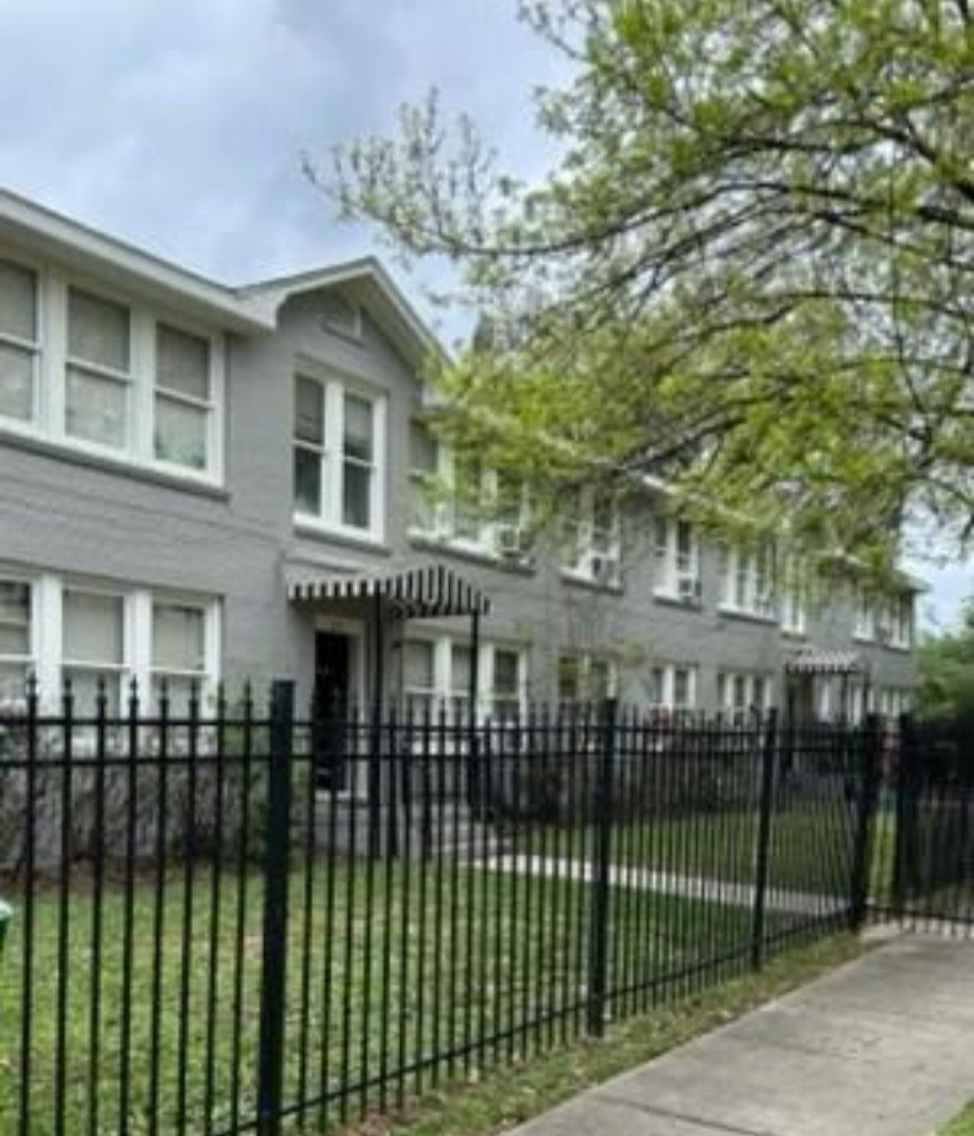4414 Woodside Street, Unit 8 Houston, TX 77023 - Photo 2 of 14 a front view of a house with a garden and plants