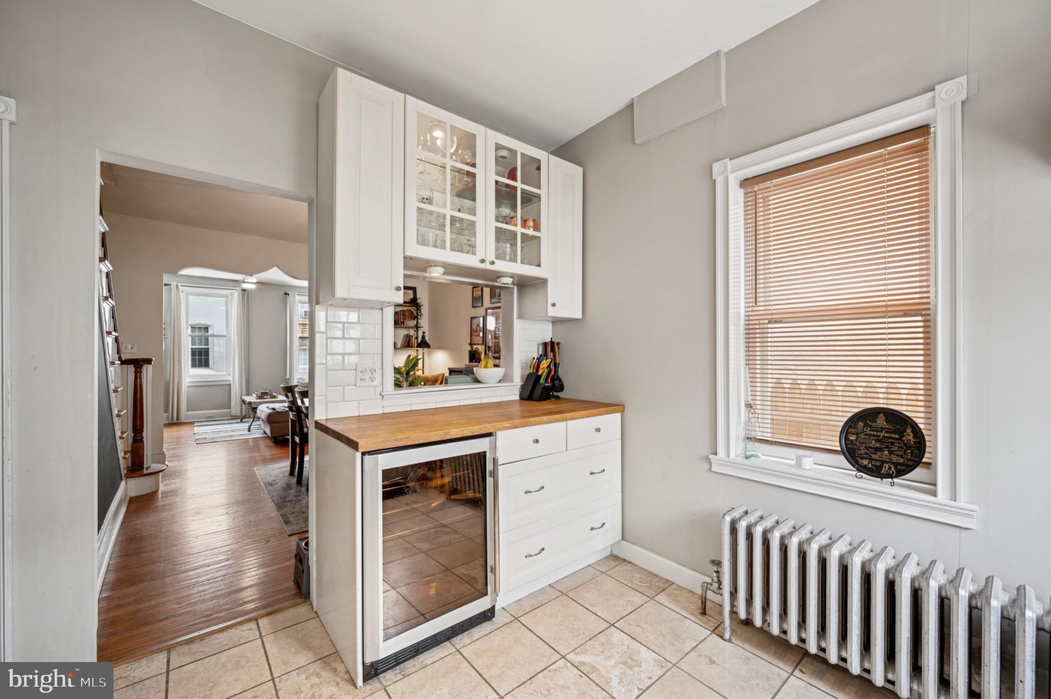 142 Davis Street Philadelphia, PA 19127 - Photo 11 of 17 a kitchen with a stove a sink and a refrigerator