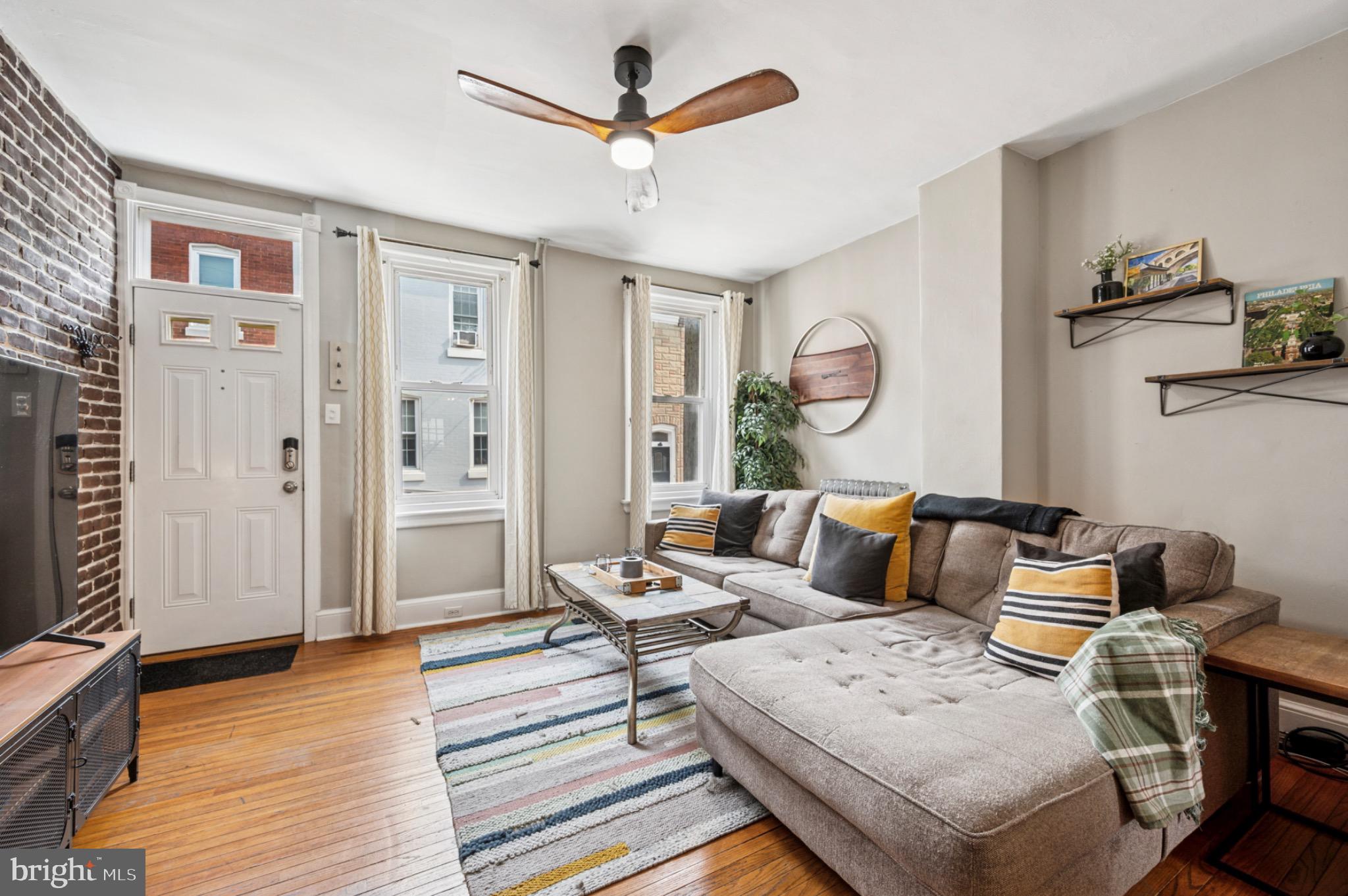 142 Davis Street Philadelphia, PA 19127 - Photo 3 of 17 a living room with furniture and wooden floor