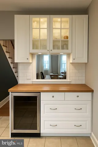 a kitchen with a sink and a window