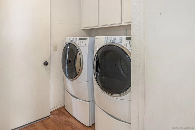 an empty room with large windows