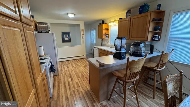 a view of a house with a tree