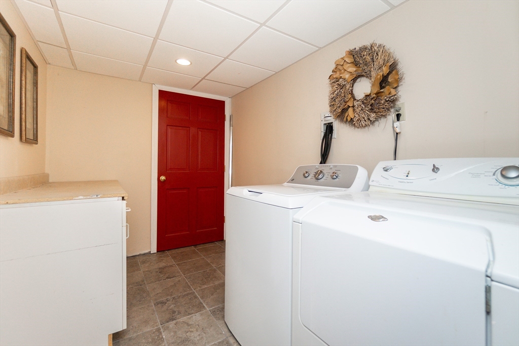 63 Bow Street Saugus, MA 01906 - Photo 26 of 42 a utility room with dryer and washer