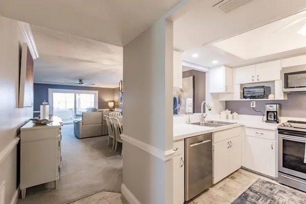 a view of living room with furniture and flat screen tv