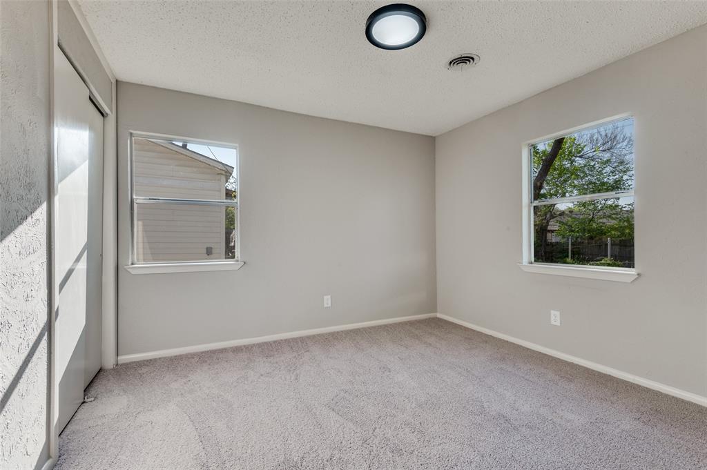 2320 Muret Street Irving, TX 75062 - Photo 10 of 12 an empty room with windows