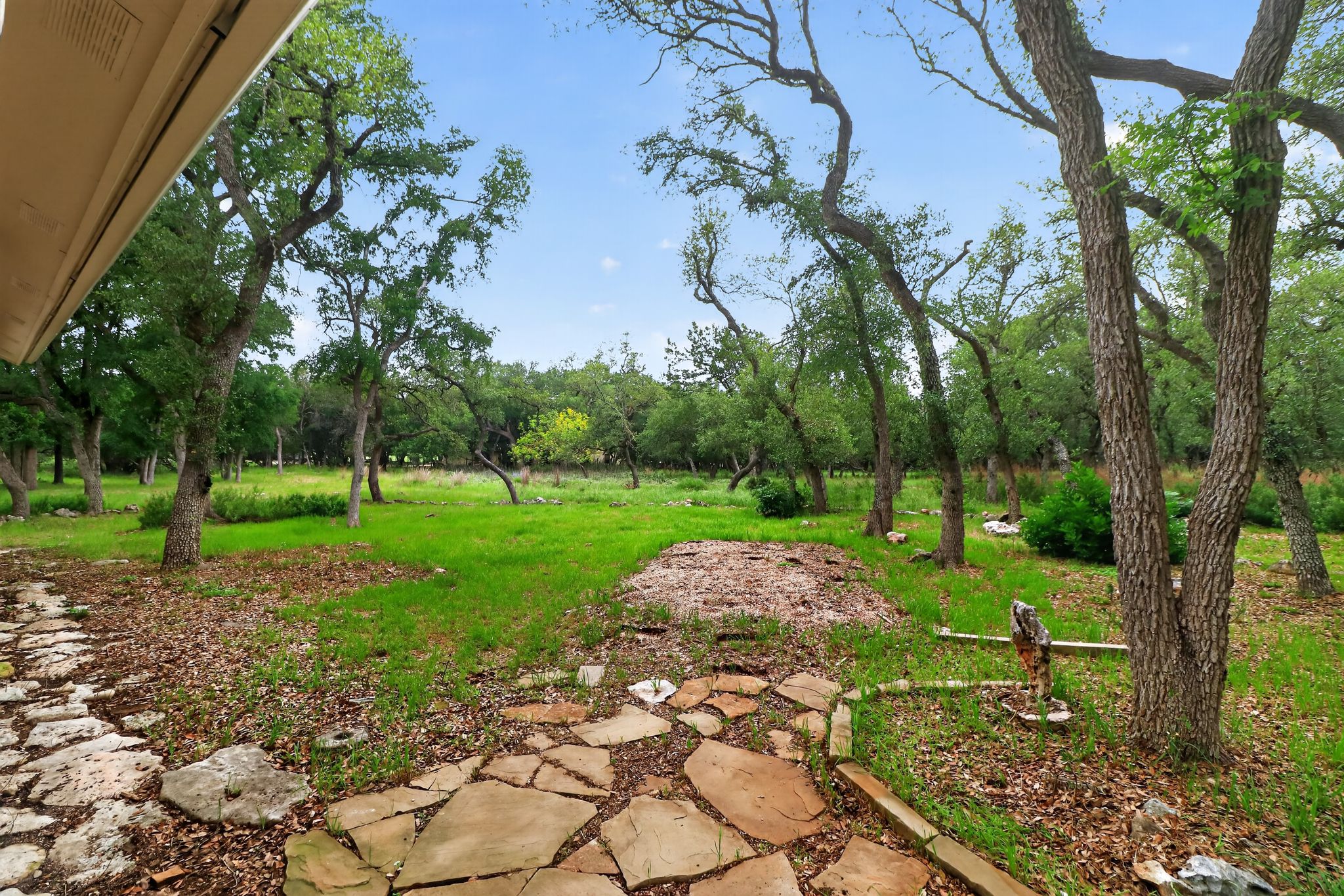 128 Mockingbird Lane Georgetown, TX 78633 - Photo 23 of 32 Pathway Out to Backyard