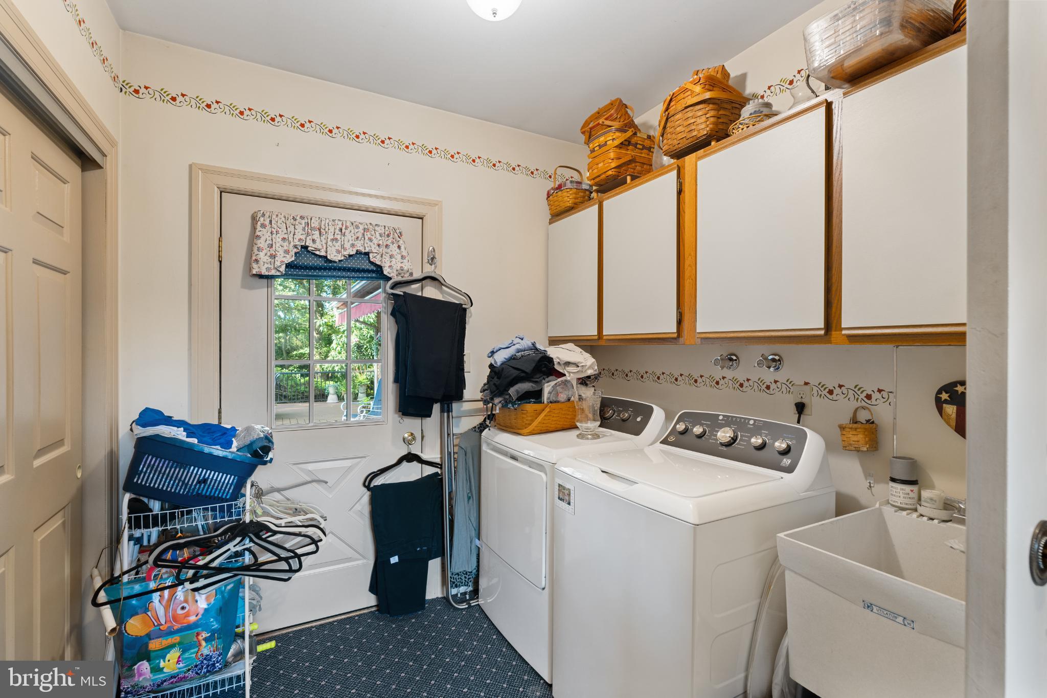 839 Rising Sun Road Telford, PA 18969 - Photo 25 of 62 a view of storage and utility room with washer and dryer